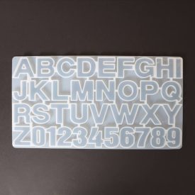 Szilikon öntőforma átlátszó betűk és számok 36 x 19,4 x 1,3cm   Szilikon öntőforma átlátszó betűk és számok 36 x 19,4 x 1,3cm