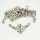 Fém sarokdísz ezüst színű 3,6cm x 3,6cm 2 db/csomag